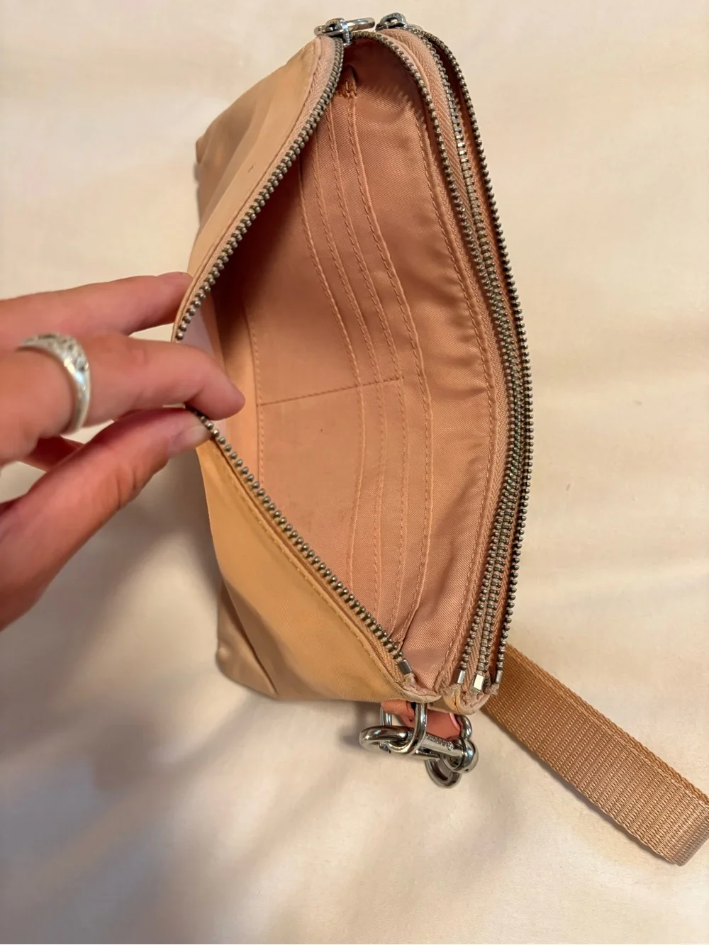 lululemon athletica Tan Wristlet Clutch with Pink Tab